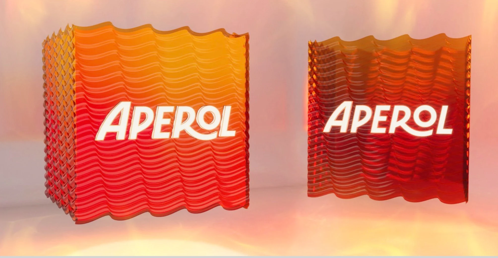 Render di due cubi arancioni a texture ondulata con il logo Aperol – Aperol Tool Kit, 2023 – design di prodotto