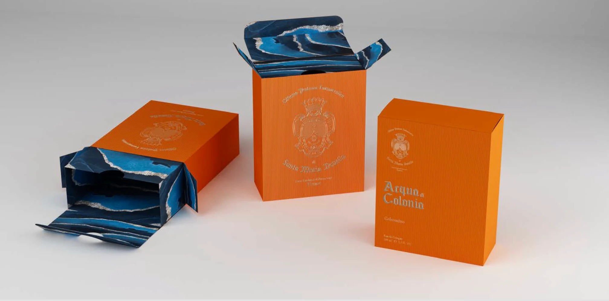Render di scatole arancioni di Acqua di Colonia aperte a rivelare l'interno marmorizzato blu a onde – Fragranze per la casa Santa Maria Novella, 2021 – graphic design, proposta