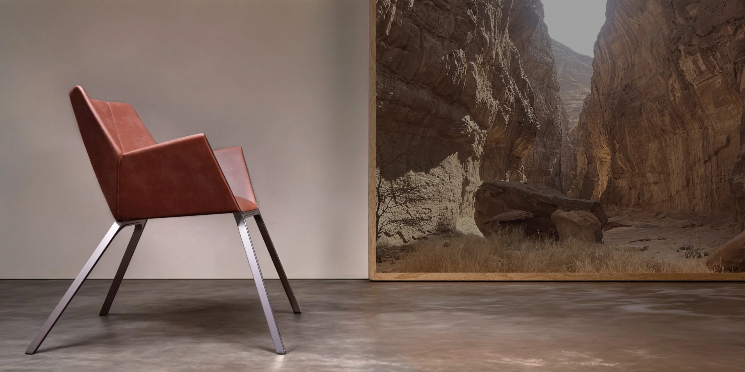 Poltrona in pelle con sottili gambe metalliche davanti a una grande foto di un canyon nel deserto – Collezione FRAME Tonino Lamborghini, Milano, Italia, 2025 – design di prodotto