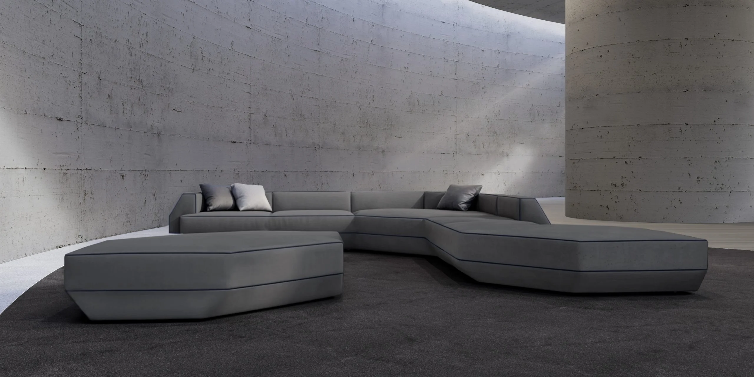 Divano modulare grigio a sezioni sfaccettate in uno spazio curvo in cemento – Collezione FRAME Tonino Lamborghini, Milano, Italia, 2025 – design di prodotto