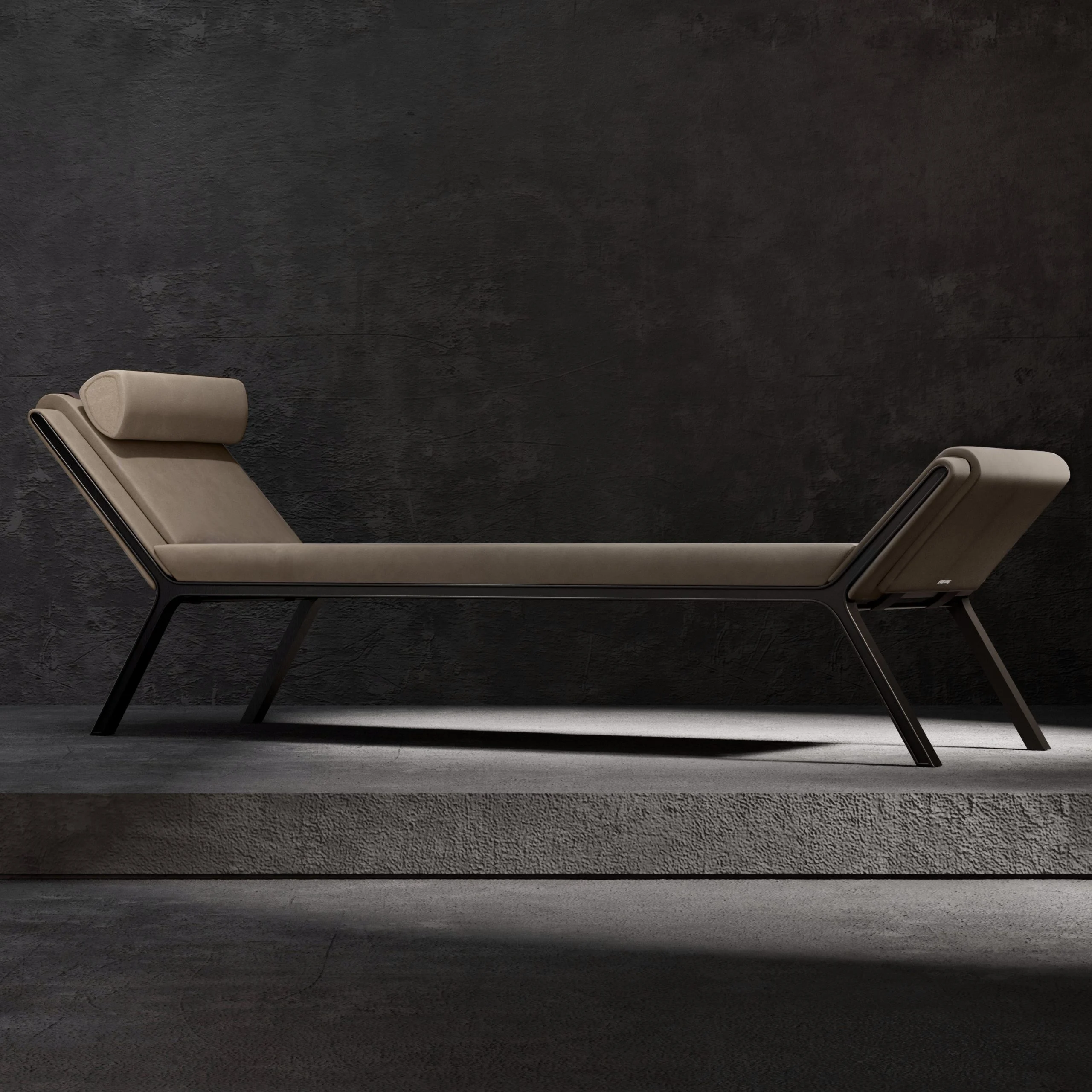Dormeuse con cuscino beige, poggiatesta a rullo e sottile telaio nero su un basamento di cemento – Collezione FRAME Tonino Lamborghini, Milano, Italia, 2025 – design di prodotto