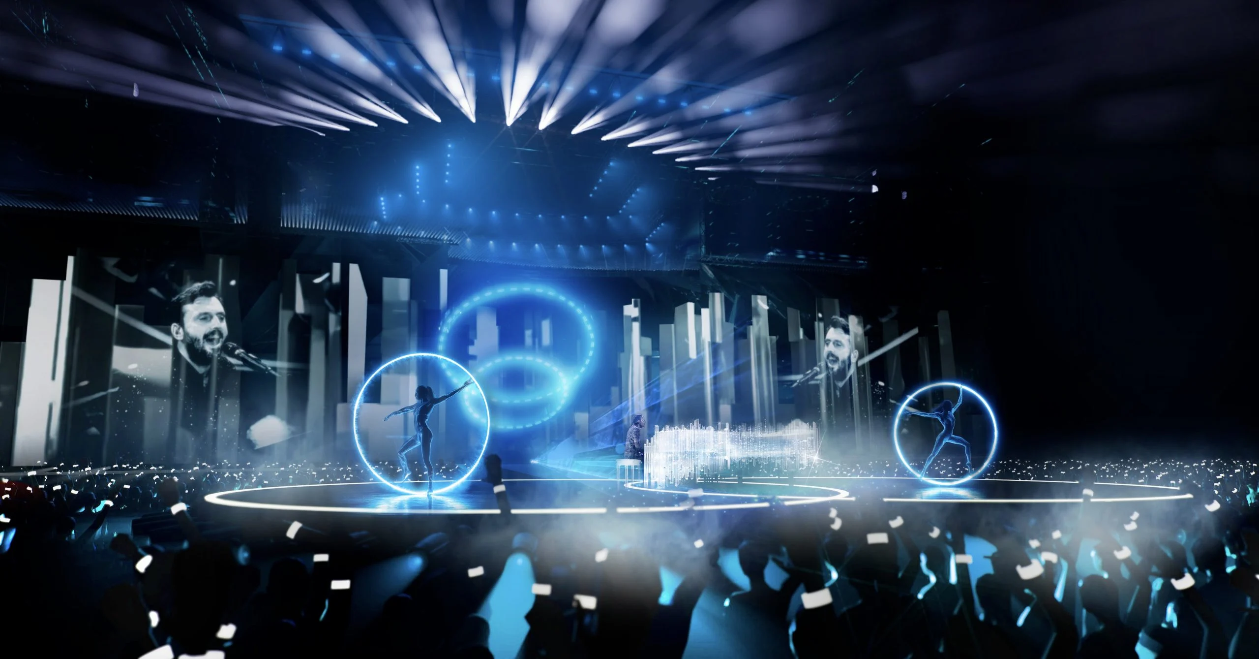 Render del palco in luce blu: cantante sugli schermi laterali, ballerini dentro anelli luminosi e pubblico con i telefoni – Cesare Cremonini Live25, Italia, 2025 – scenografia per concerti